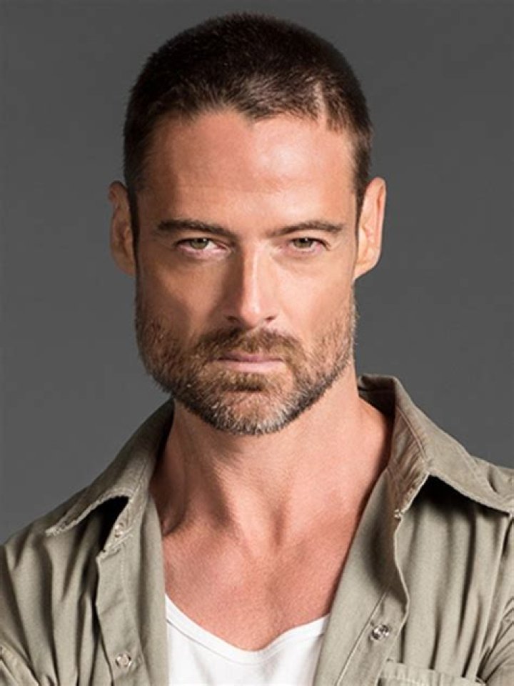 Actor William Miller as Adriel in 'Warrior Nun' Season 2. He's wearing black, has his hair pulled into a ponytail, and looks like he's about to snap his fingers.