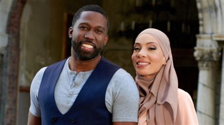 Bilal and Shaeeda together in front of a red background for '90 Day FIancé' Season 9 promo.