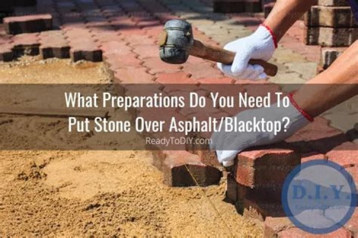Can you put stone over asphalt?