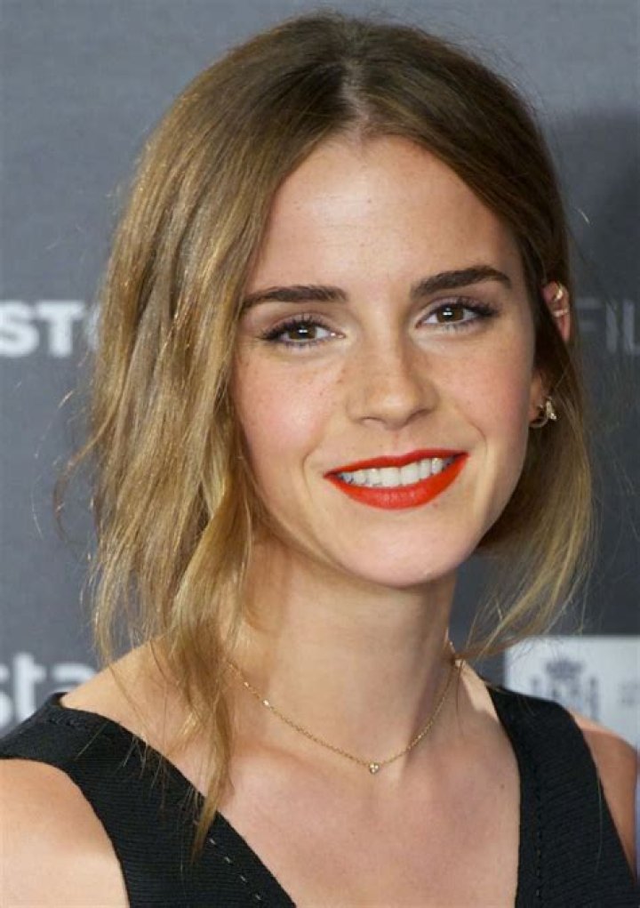 Emma Watson posing at the premiere of 'Beauty and the Beast'.