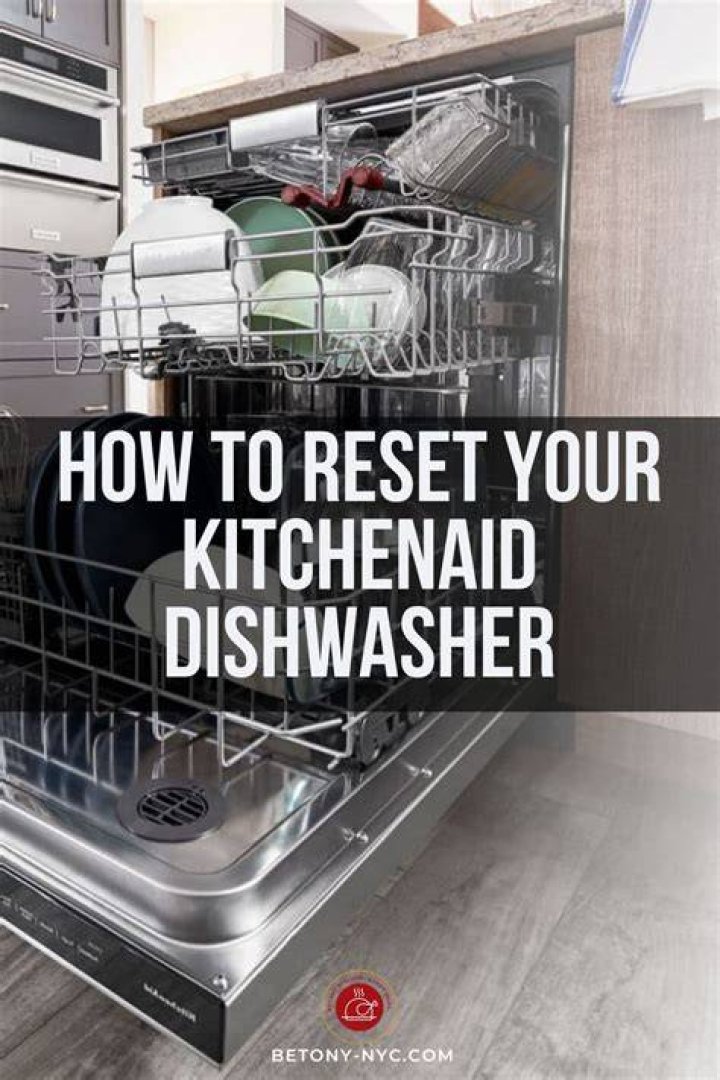 How do I reset my KitchenAid dishwasher?