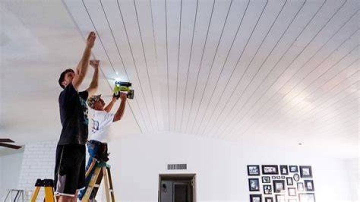 How do you install wall paneling on a ceiling?