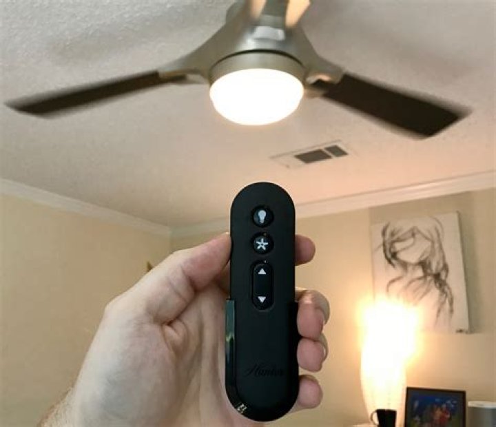 How do you sync a Hunter ceiling fan remote?