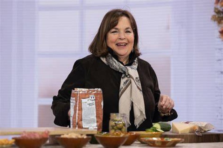 Ina Garten smiles as she stands in front of the counter inside the "barn" on her property in East Hampton, New York.