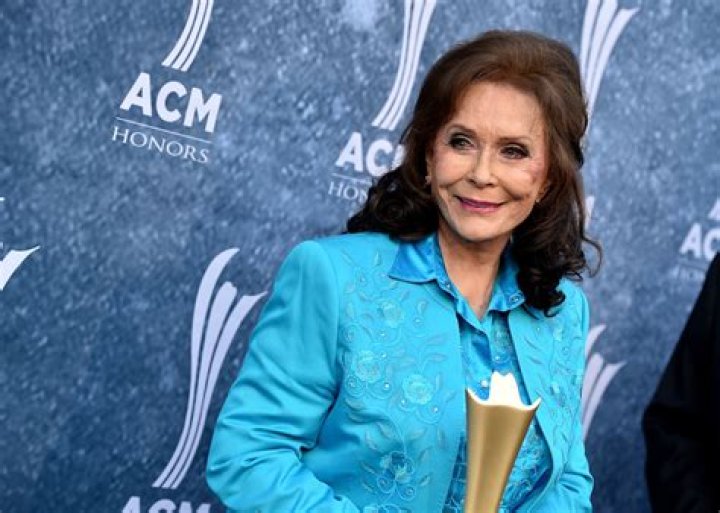 (L) Loretta Lynn arrives at the 39th Annual Songwriters Hall of Fame Induction Ceremony on June 19, 2008. (C) Patsy Cline poses for a portrait c. 1960. (R) Beverly D'Angelo during the 58th Annual Primetime Emmy Awards in 2006. D'Angelo played Cline in the movie about Loretta Lynn's life, 'Coal Miner's Daughter.'