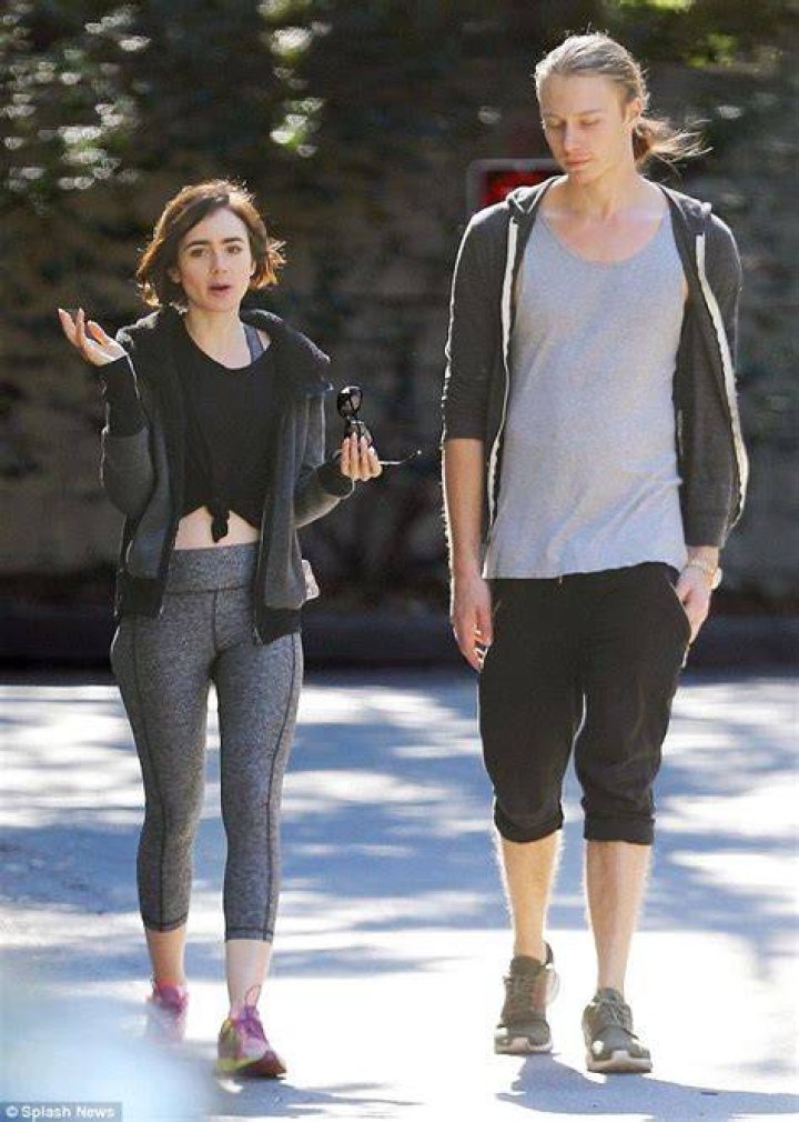 Lily Collins on hike with male friend after being linked to Nick Jonas