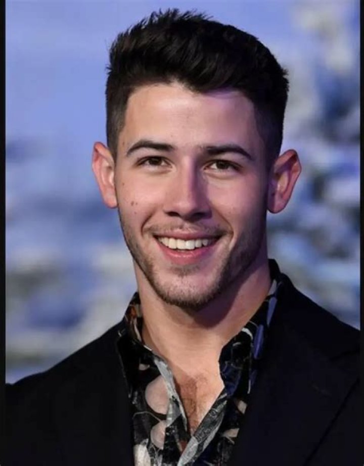 Nick Jonas Shys Away From Lily Collins' Questions At Super Bowl Party
