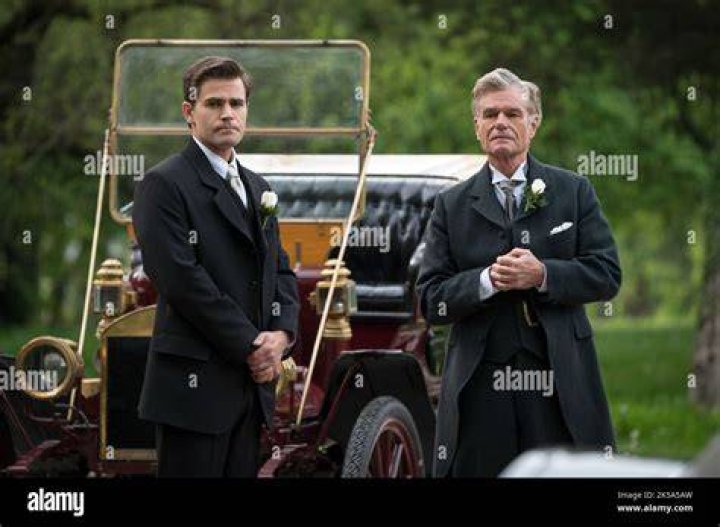 Paul Wesley and Harry Hamlin standing in front of a car in 'Flowers in the Attic: The Origin'