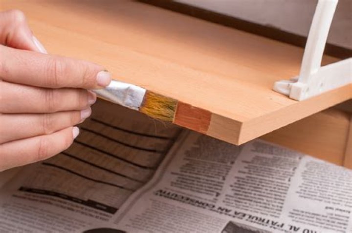 Quick Answer: How Do You Paint Over Varnished Cabinets??