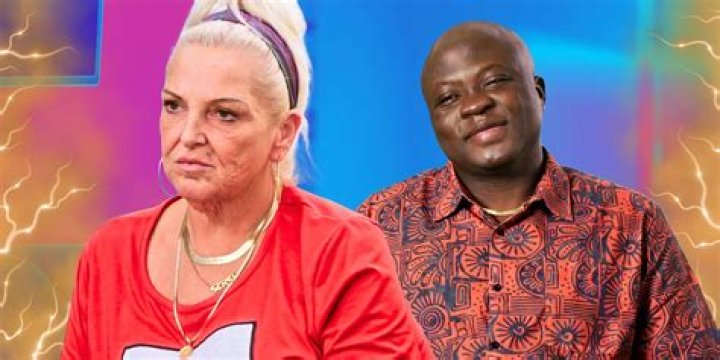 Smiling Angela Deem of '90 Day: The Last Resort' sitting next to a man in a baseball cap