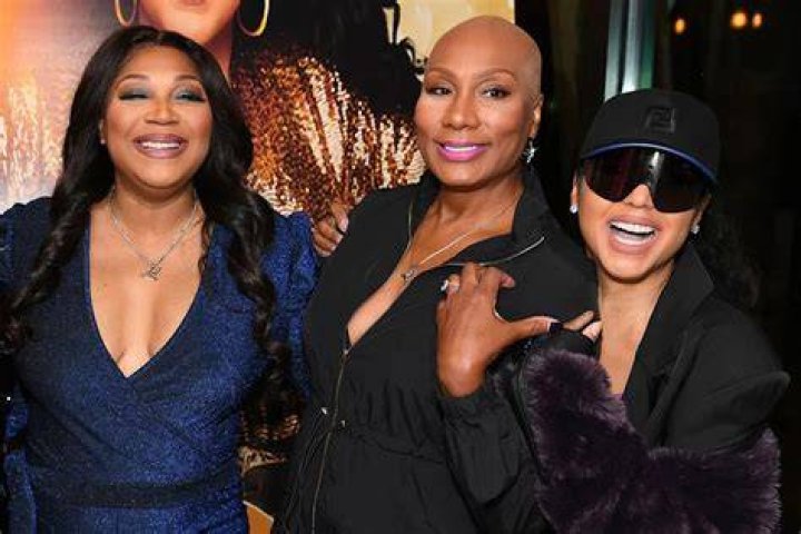 Towanda Braxton with Trina Braxton at AOL Build; Towanda's brankruptcy case was dismissed