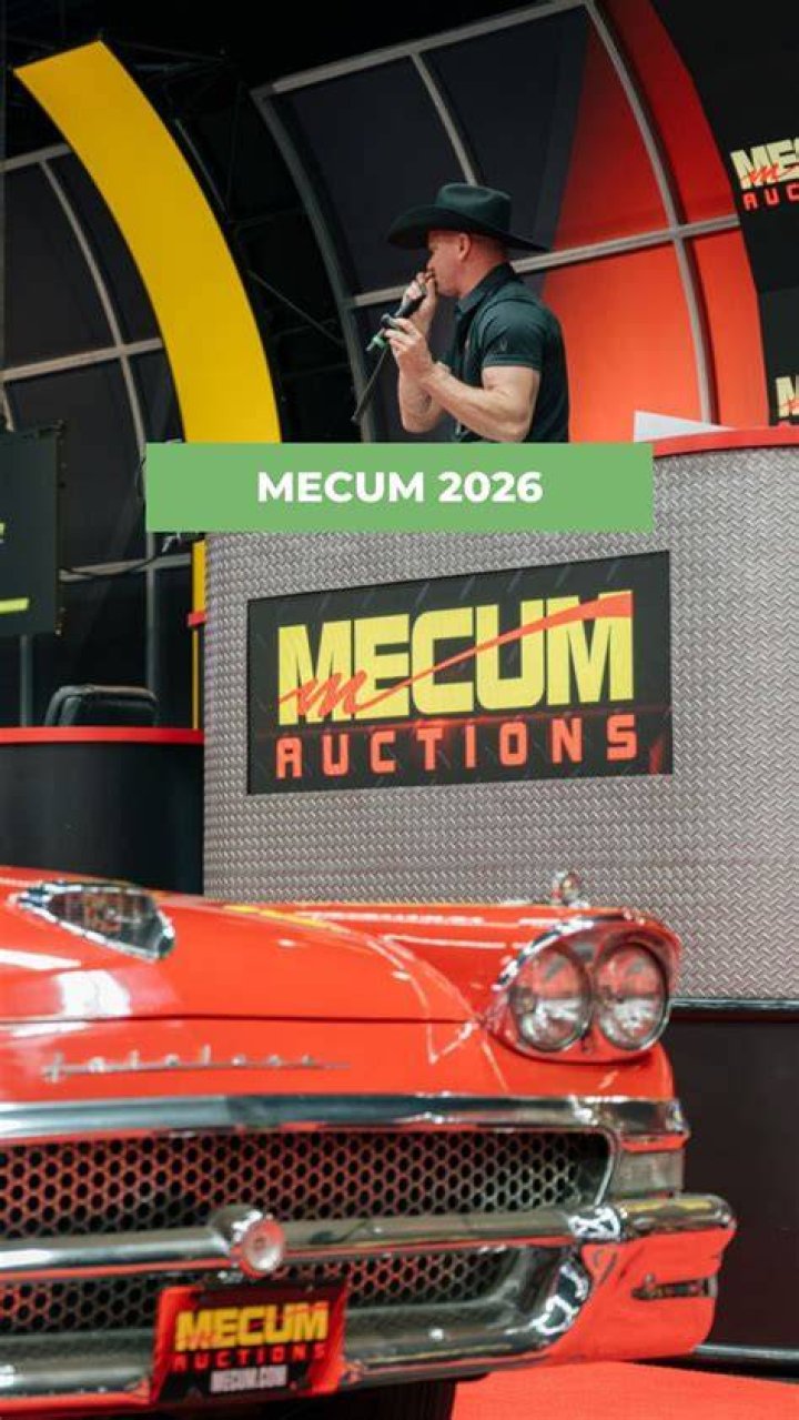 What percentage does Mecum Auctions take?