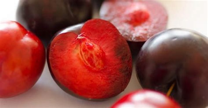 Which plums are deep red inside?